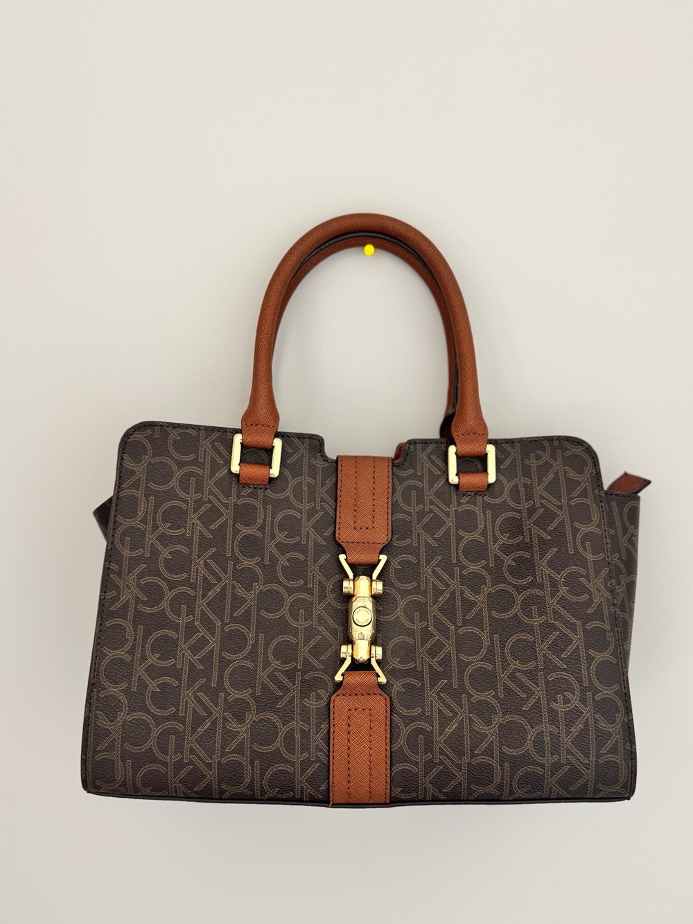Calvin Klein Brown Monogram purse  with Tan Handles